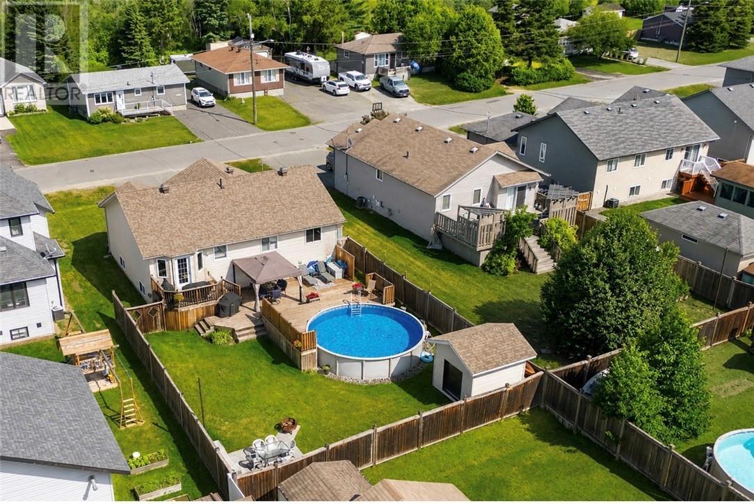 3101 River Road, Val Caron, ON - Outdoor With Above Ground Pool With Deck Patio Veranda