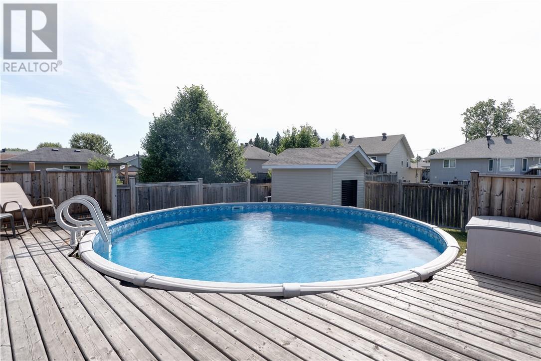 3101 River Road, Val Caron, ON - Outdoor With Above Ground Pool With Deck Patio Veranda With Backyard