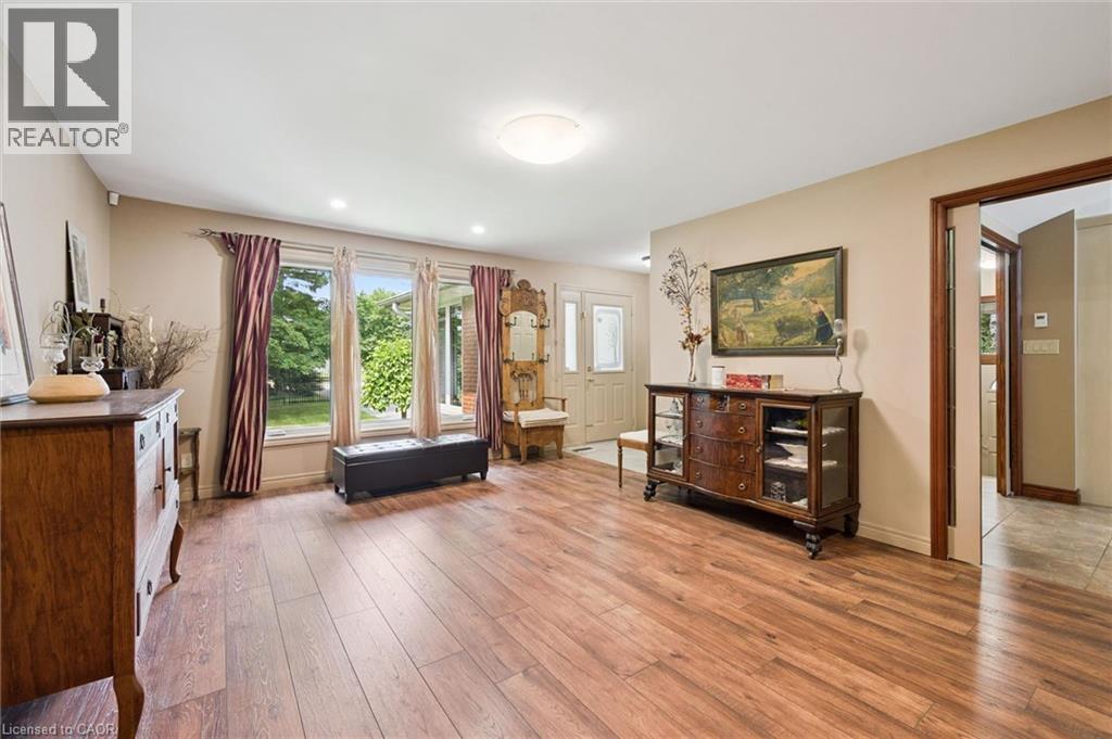 Front room has new crank style windows and is separated from the kitchen with French glass style pocket doors - 410 Avenue Road, Cambridge, ON - Indoor