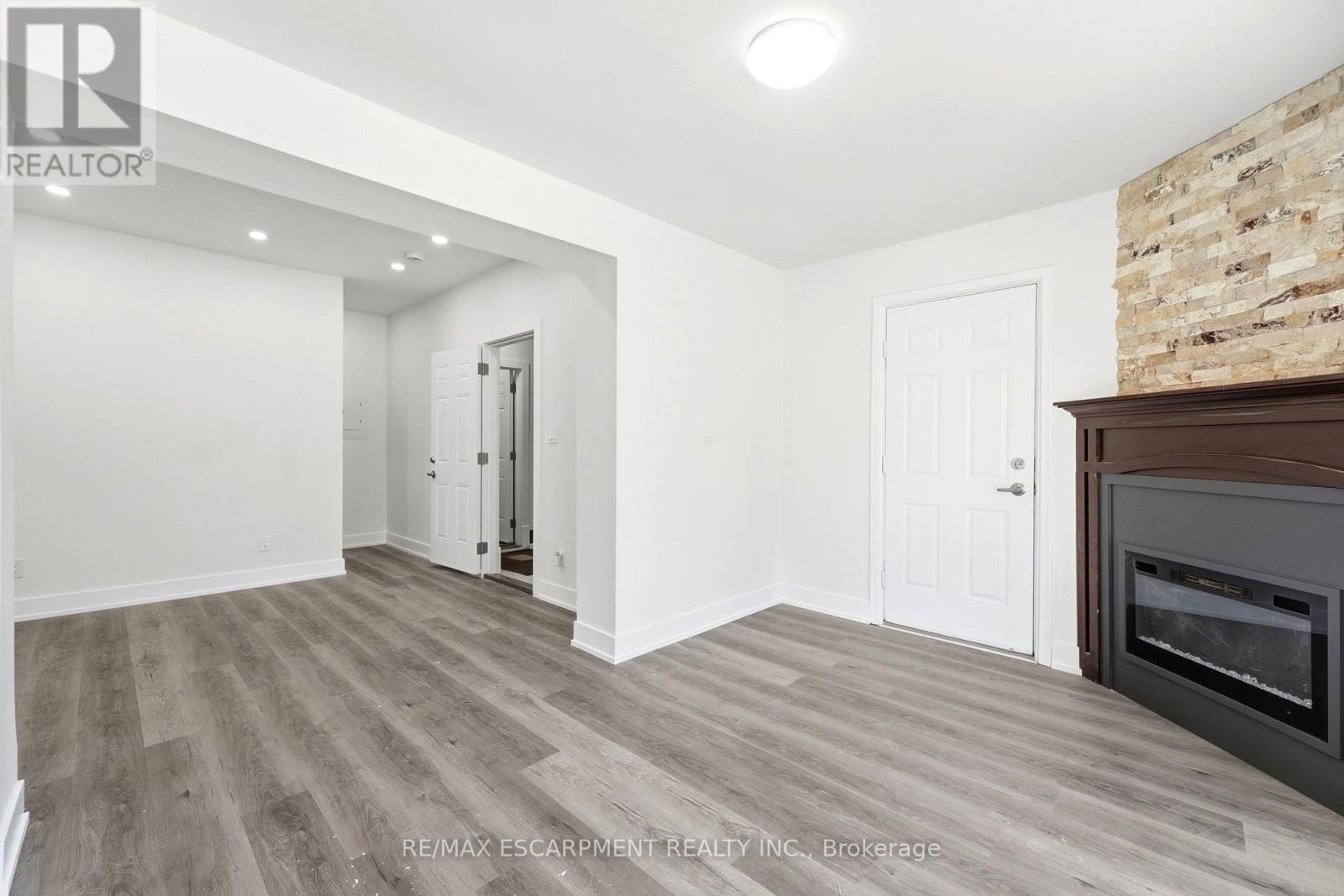 968 Main Street E, Hamilton, ON - Indoor With Fireplace