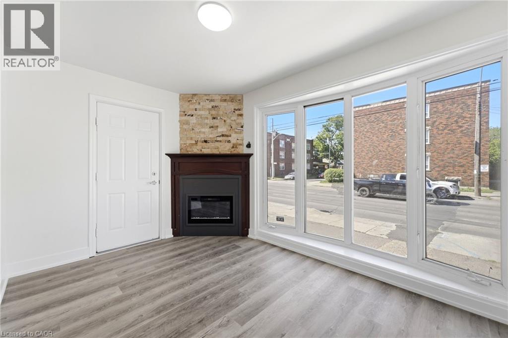 968 Main Street E, Hamilton, ON - Indoor Photo Showing Living Room With Fireplace