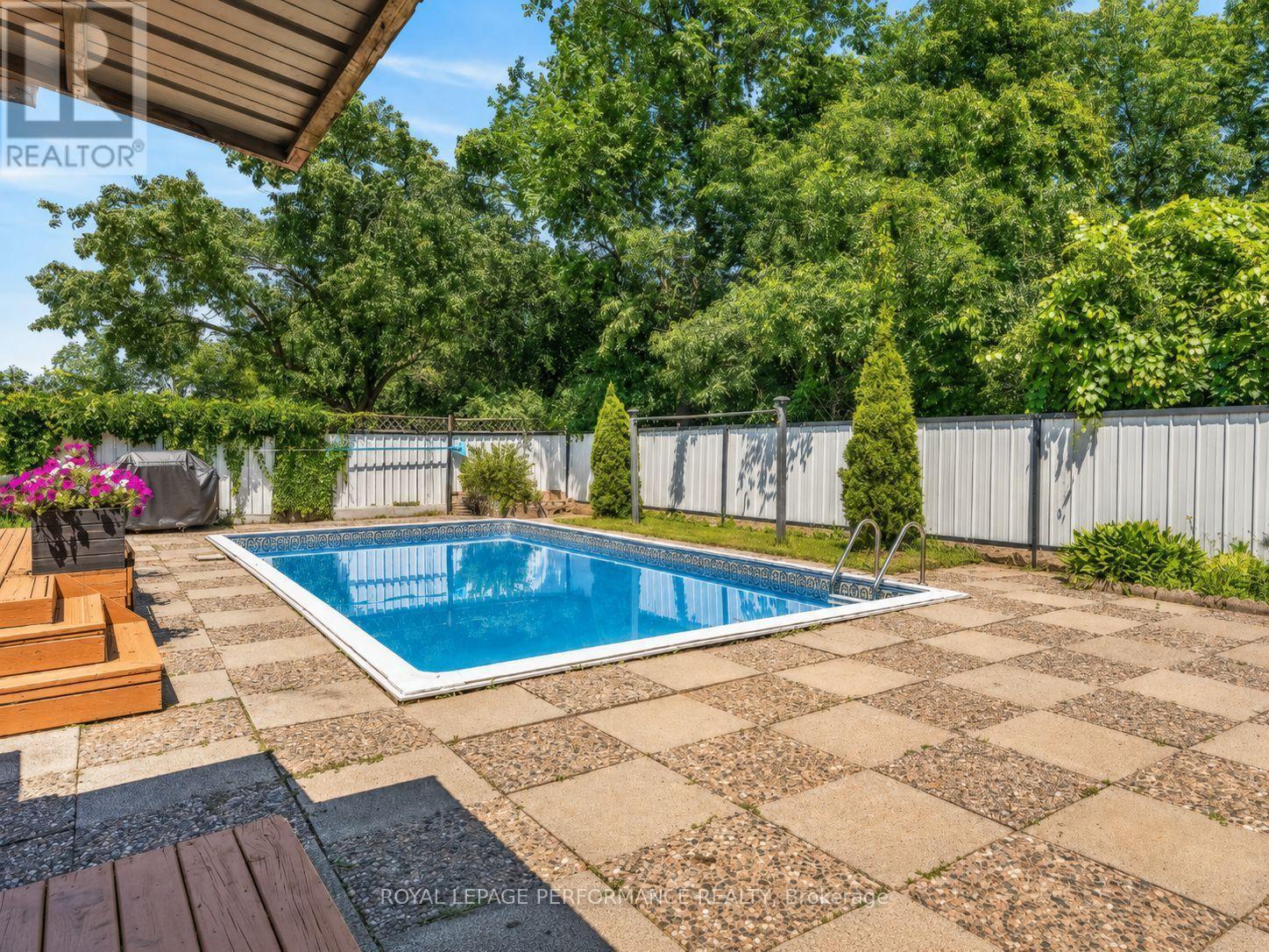 2179 Erinbrook Crescent, Ottawa, ON - Outdoor With In Ground Pool With Deck Patio Veranda With Backyard
