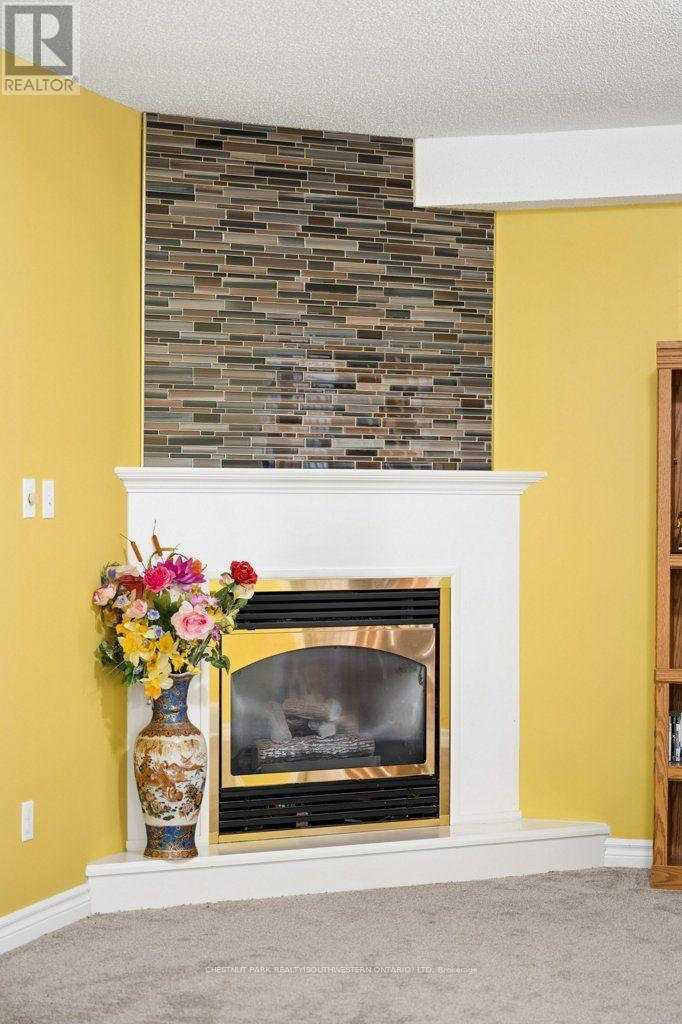 158 Bankside Drive, Kitchener, ON - Indoor Photo Showing Living Room With Fireplace
