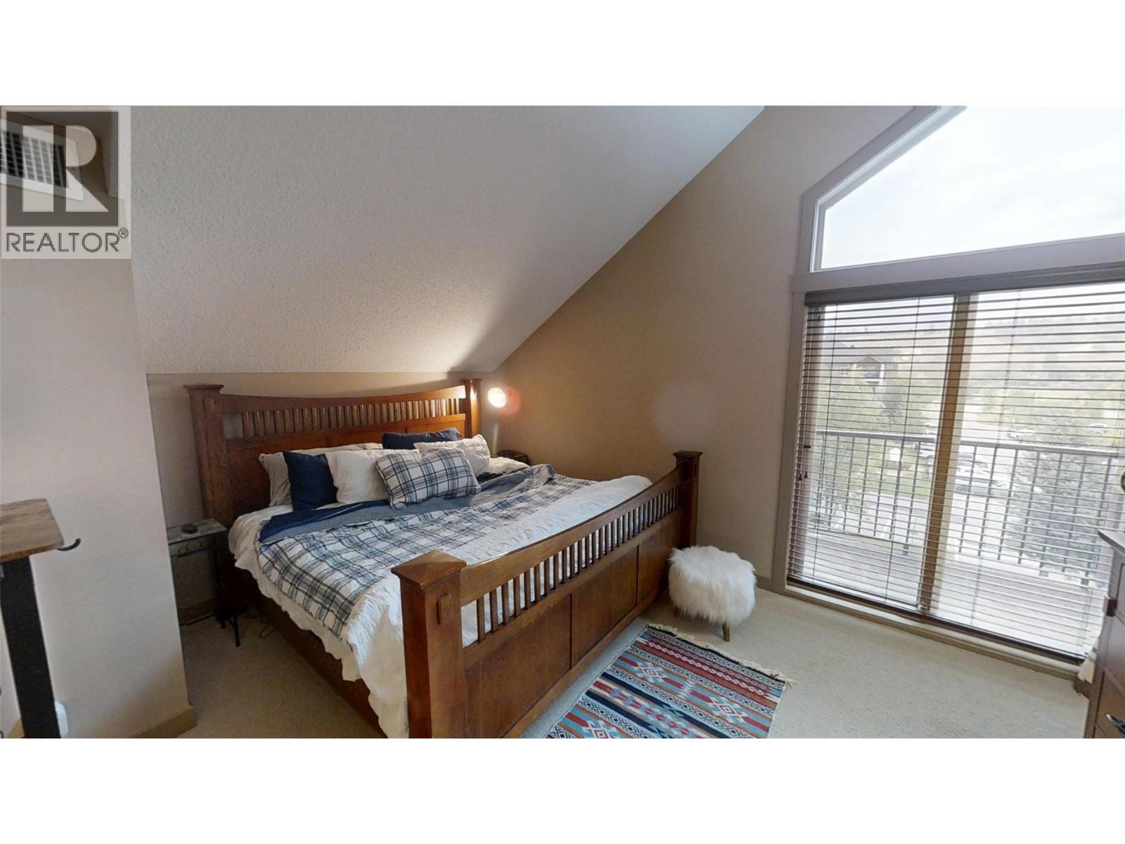 205 Third Avenue Unit# 1403, Invermere, BC - Indoor Photo Showing Bedroom
