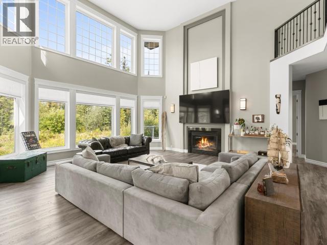 112 Alusru Way, Whitehorse, YT - Indoor Photo Showing Living Room With Fireplace