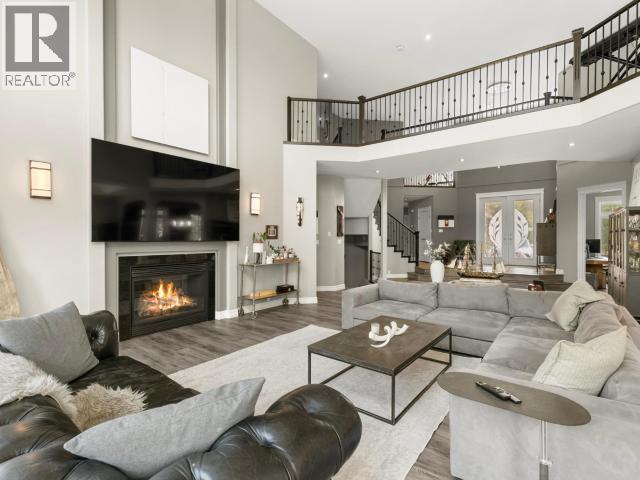 112 Alusru Way, Whitehorse, YT - Indoor Photo Showing Living Room With Fireplace