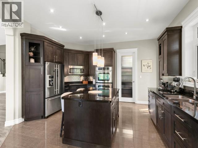 112 Alusru Way, Whitehorse, YT - Indoor Photo Showing Kitchen With Double Sink With Upgraded Kitchen