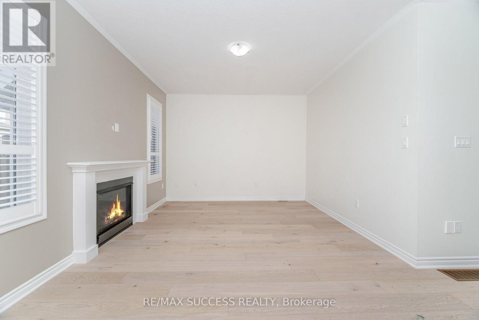 28 Pickett Place, Cambridge, ON - Indoor Photo Showing Other Room With Fireplace