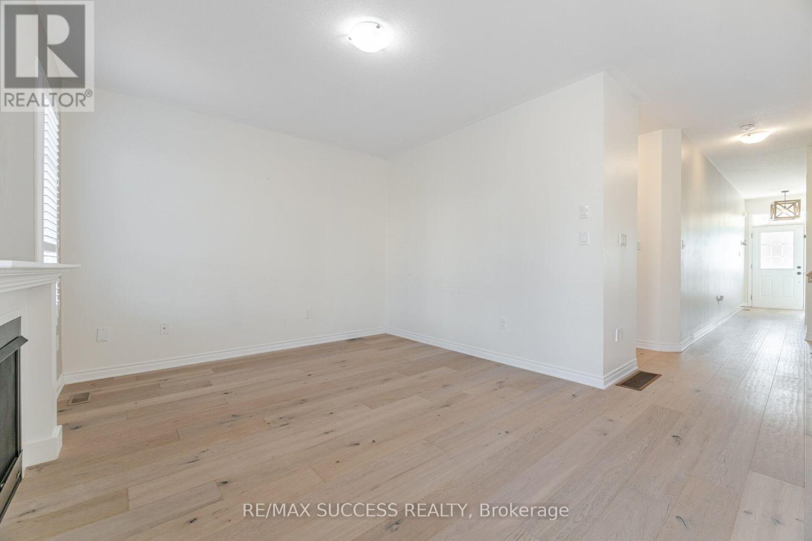 28 Pickett Place, Cambridge, ON - Indoor Photo Showing Other Room With Fireplace