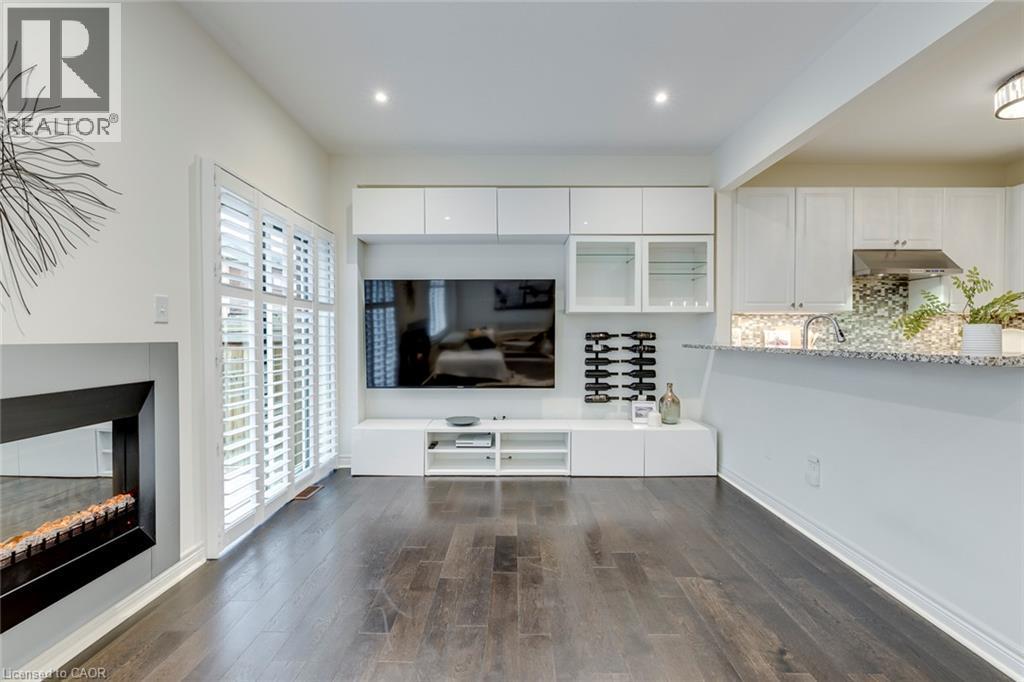 598 Bessborough Drive, Milton, ON - Indoor Photo Showing Living Room With Fireplace