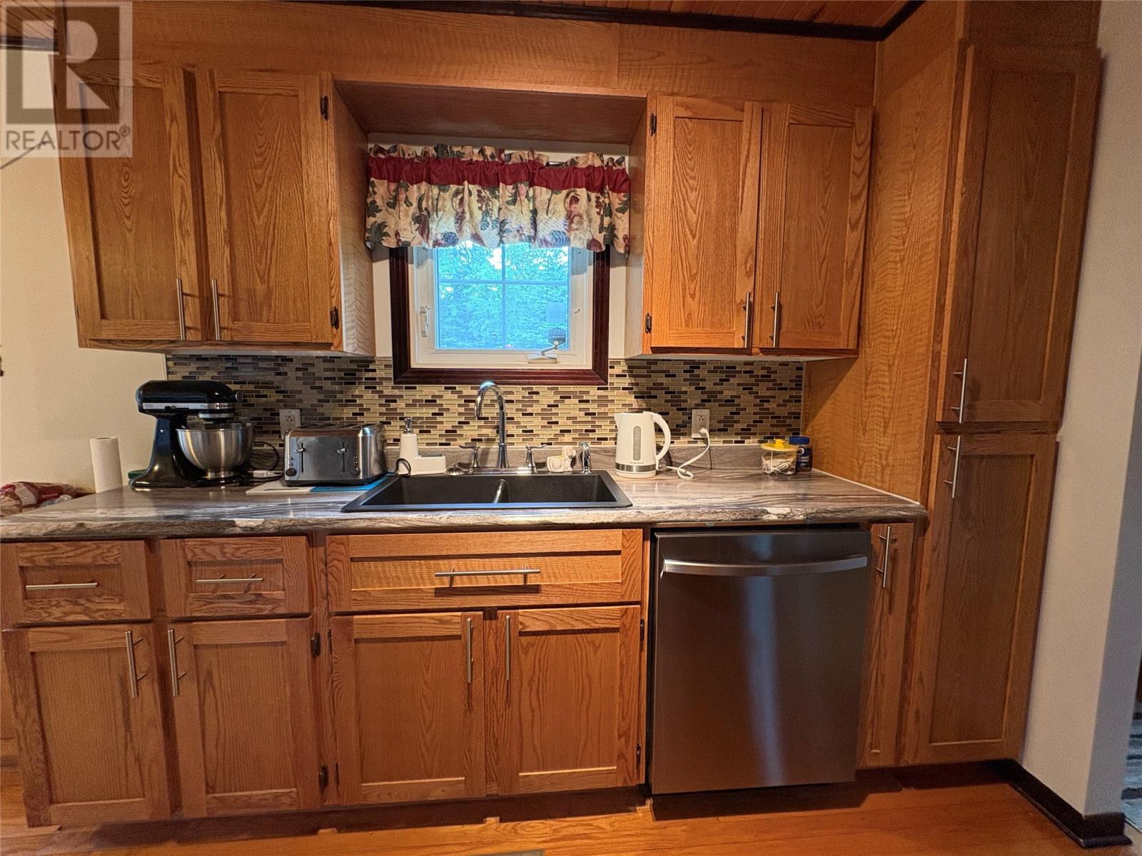 14 Juniper Road, St Anthony, NL - Indoor Photo Showing Kitchen With Double Sink