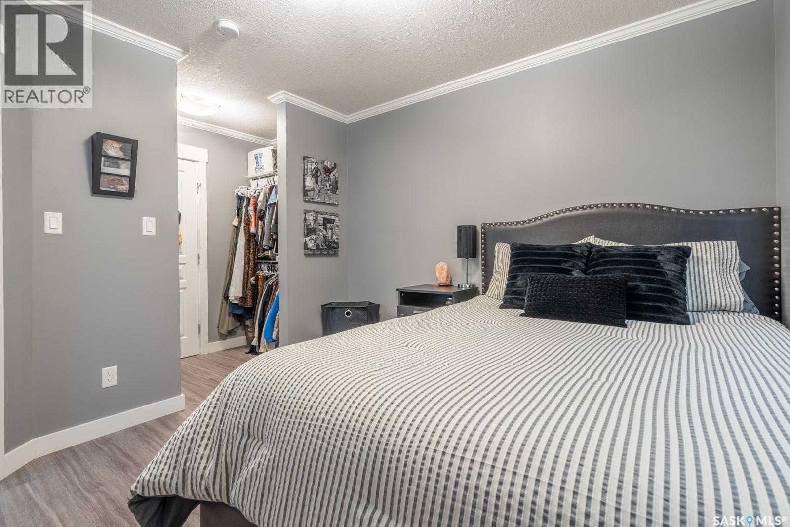 404 5301 Universal Crescent, Regina, SK - Indoor Photo Showing Bedroom