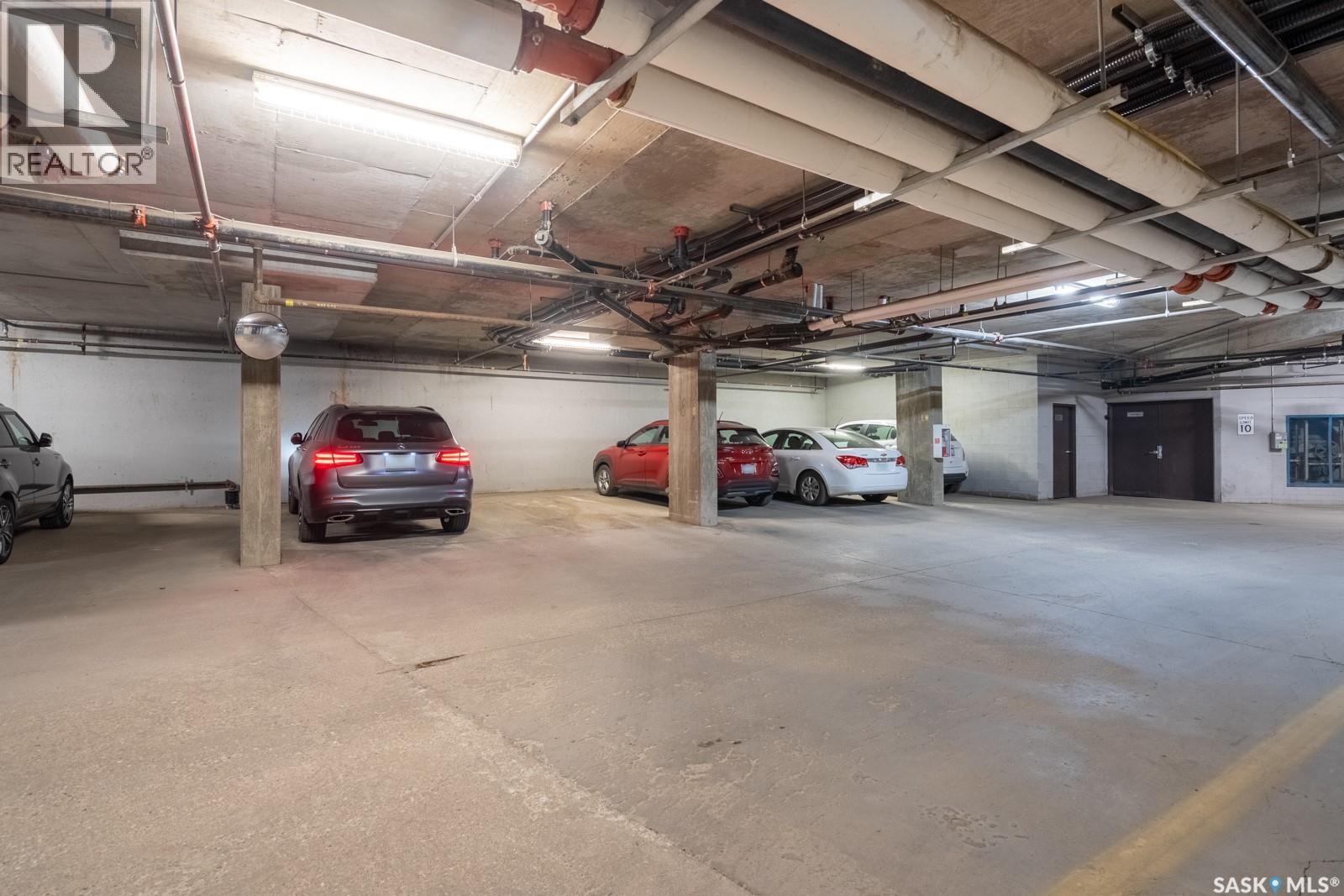404 5301 Universal Crescent, Regina, SK - Indoor Photo Showing Garage