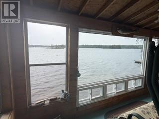 259 Ashigami Road E, Wahnapitae, ON - Indoor Photo Showing Other Room With Body Of Water