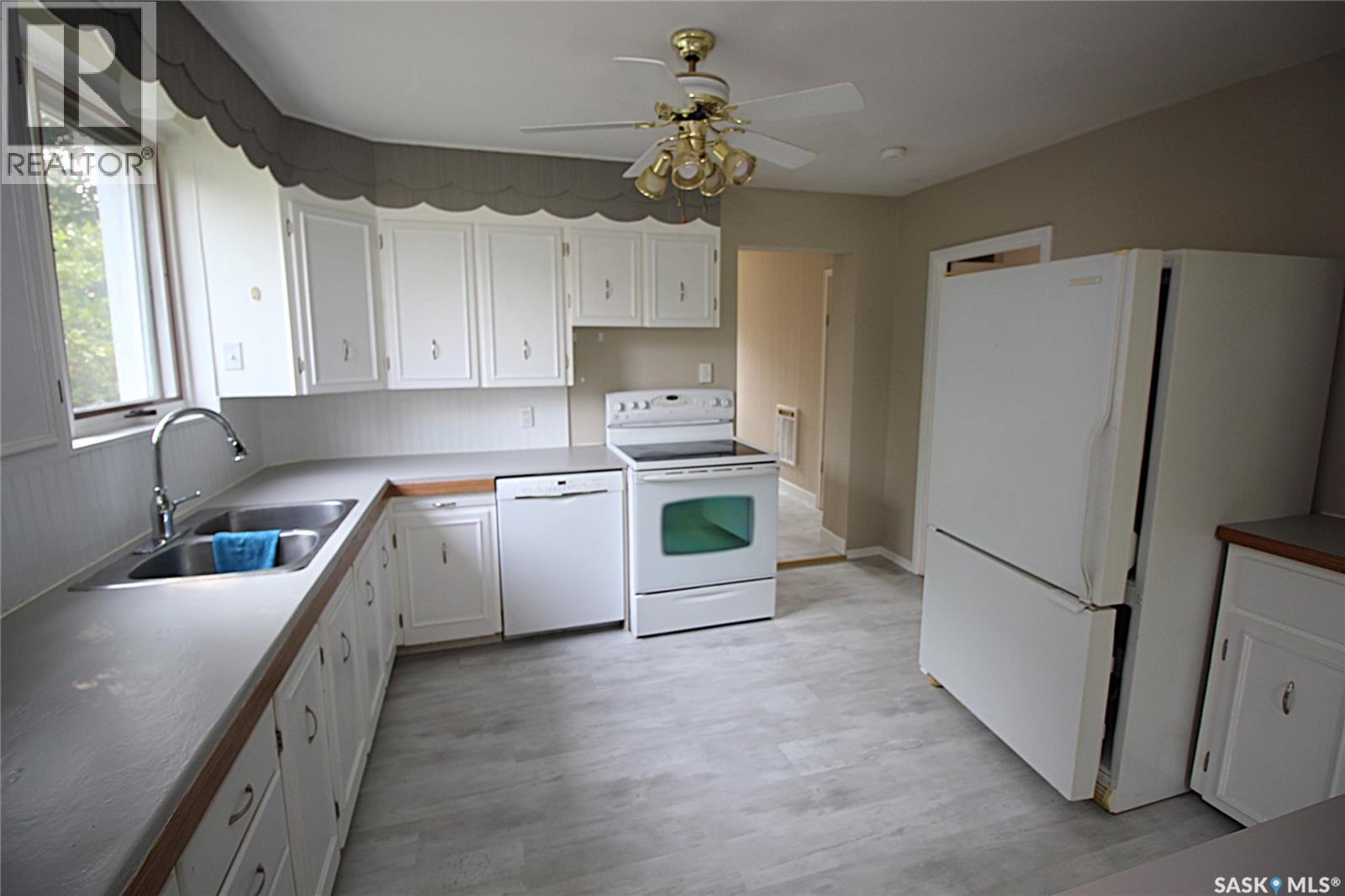 700 York Street, Indian Head, SK - Indoor Photo Showing Kitchen With Double Sink