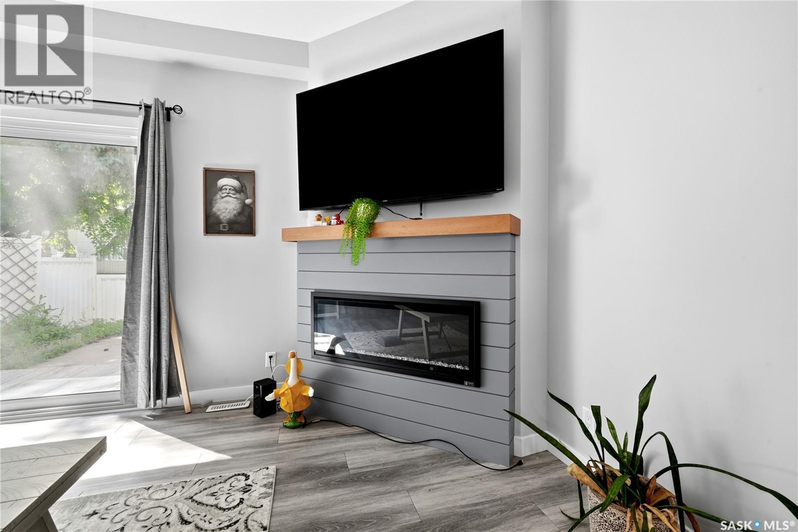 4005 Gordon Road, Regina, SK - Indoor With Fireplace