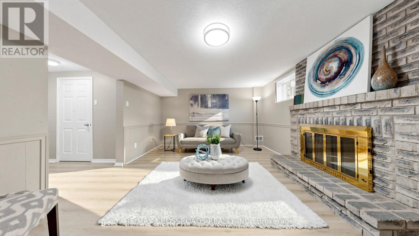 70 Halfmoon Square, Toronto, ON - Indoor Photo Showing Living Room With Fireplace