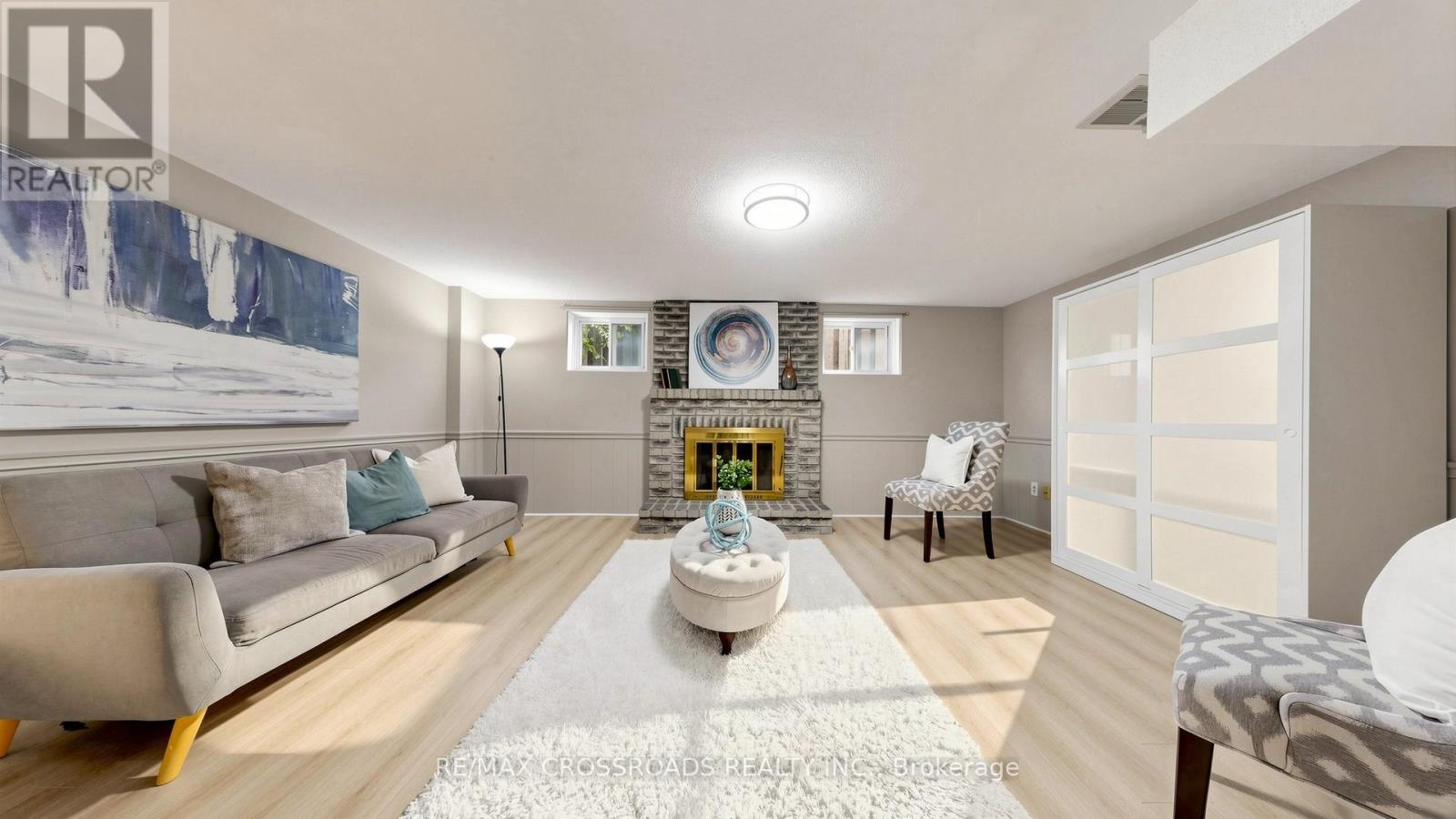 70 Halfmoon Square, Toronto, ON - Indoor Photo Showing Living Room With Fireplace