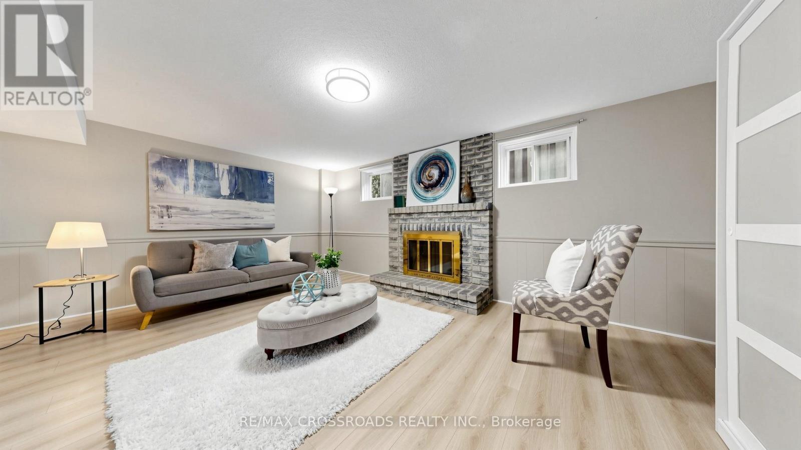 70 Halfmoon Square, Toronto, ON - Indoor Photo Showing Living Room With Fireplace