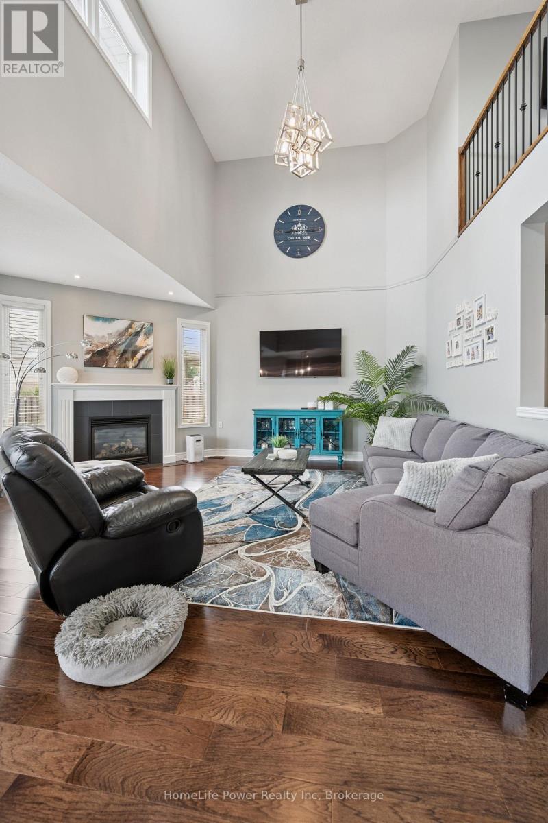 183 Townsend Drive, Woolwich, ON - Indoor Photo Showing Living Room With Fireplace