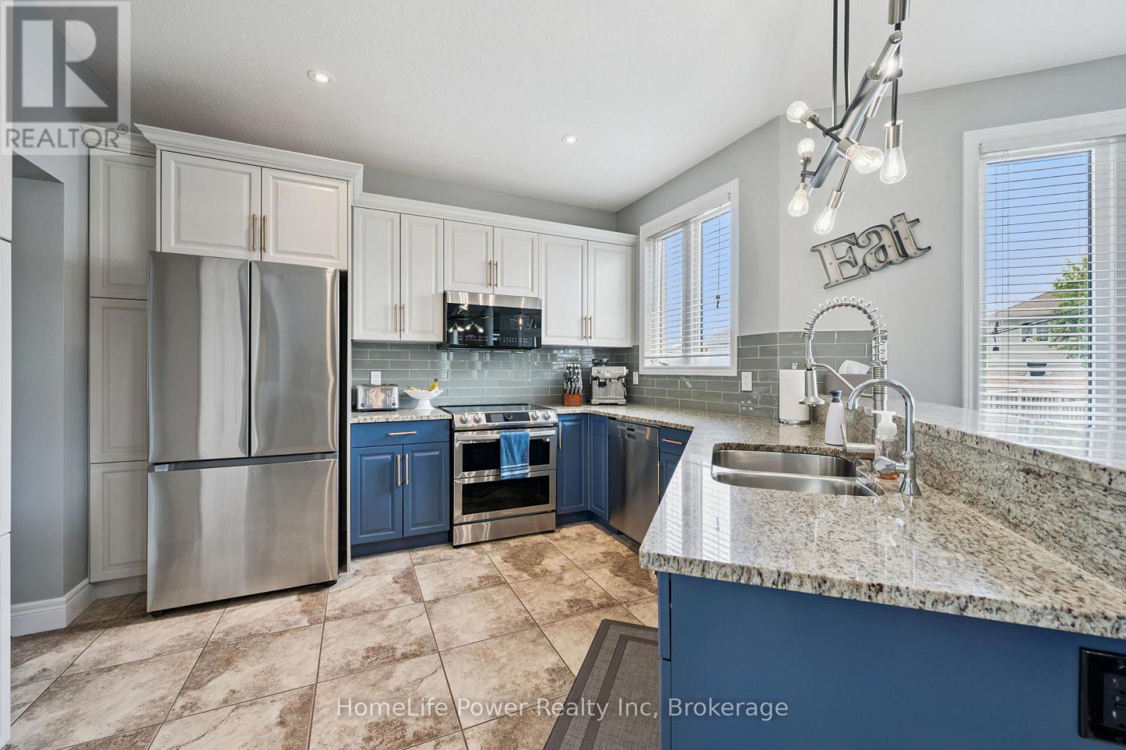 183 Townsend Drive, Woolwich, ON - Indoor Photo Showing Kitchen With Double Sink With Upgraded Kitchen