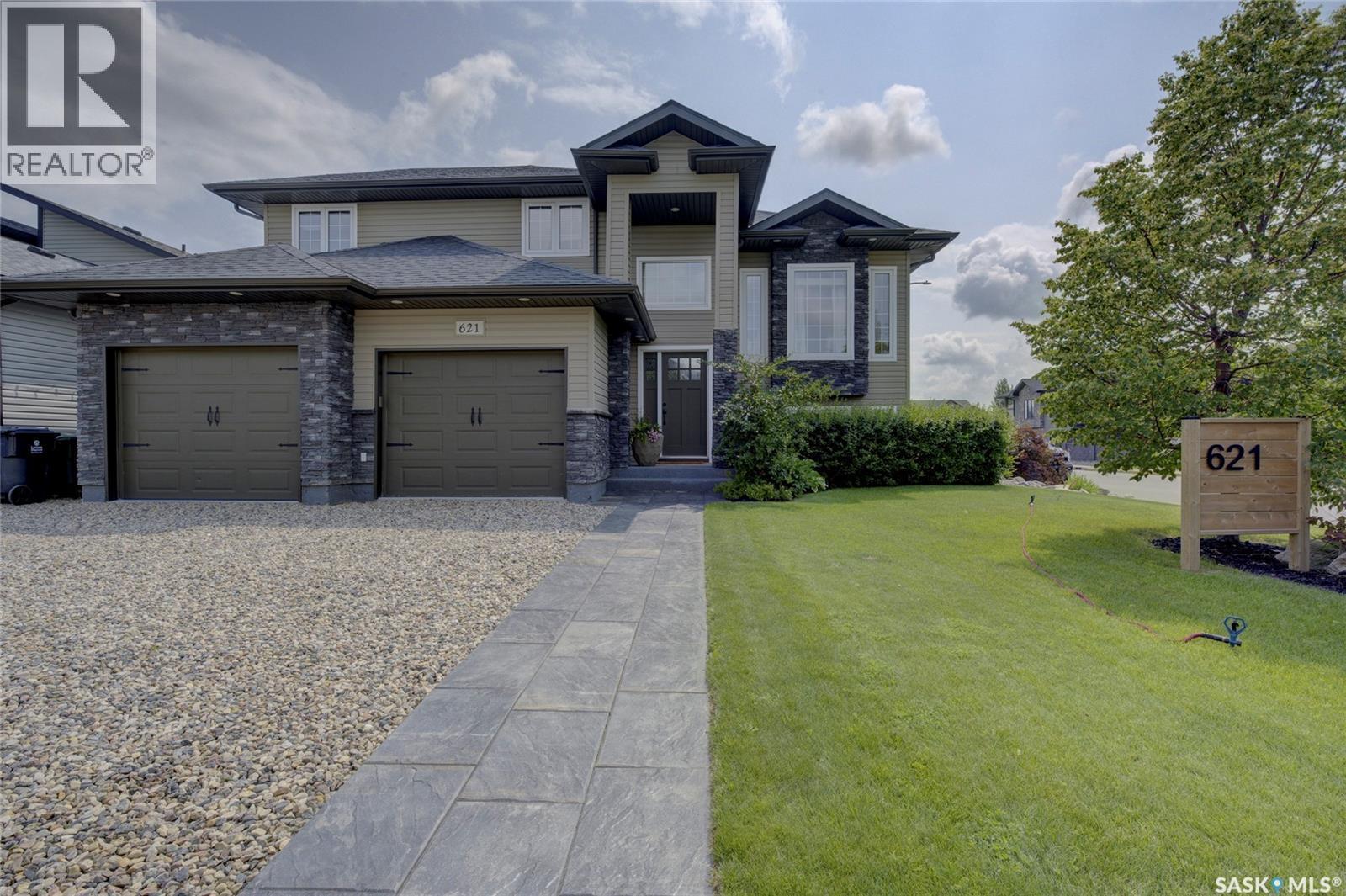 621 Braun Lane, Warman, SK - Outdoor With Facade