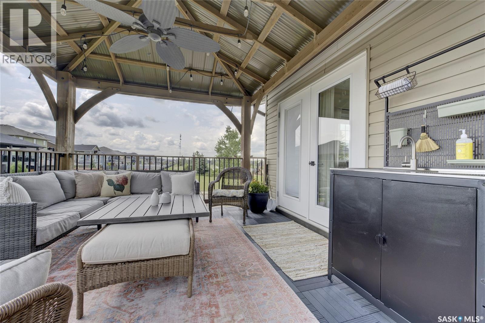 621 Braun Lane, Warman, SK - Outdoor With Deck Patio Veranda With Exterior