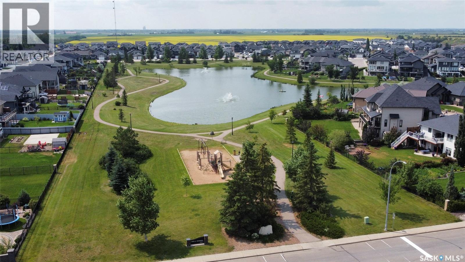 621 Braun Lane, Warman, SK - Outdoor With Body Of Water With View