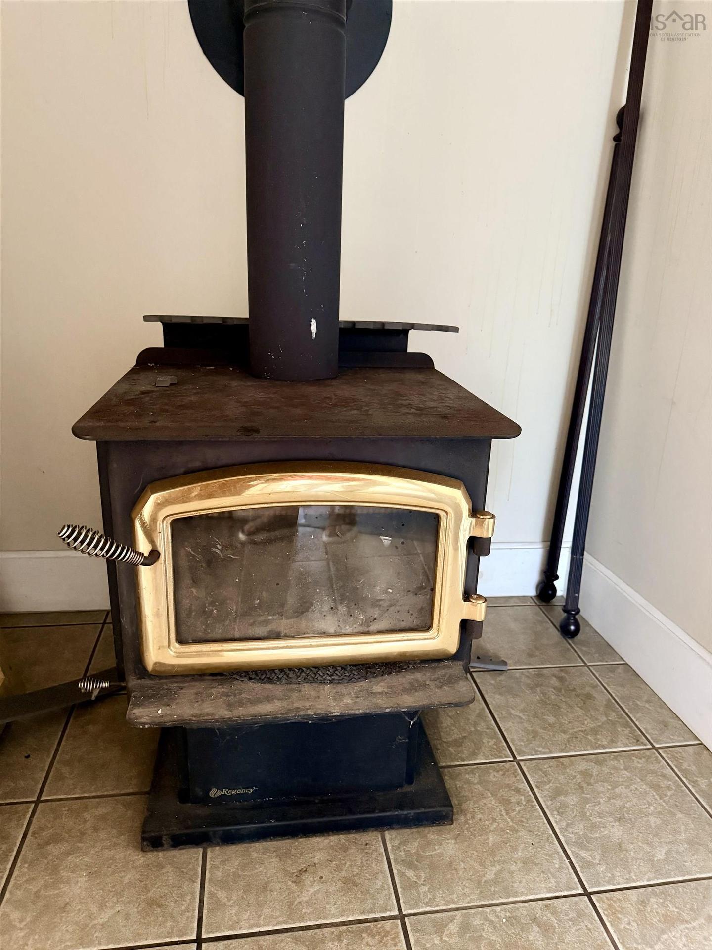 27 Starrs Road, Yarmouth, NS - Indoor With Fireplace