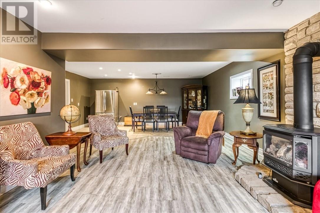 33 Oak, Capreol, ON - Indoor Photo Showing Living Room With Fireplace