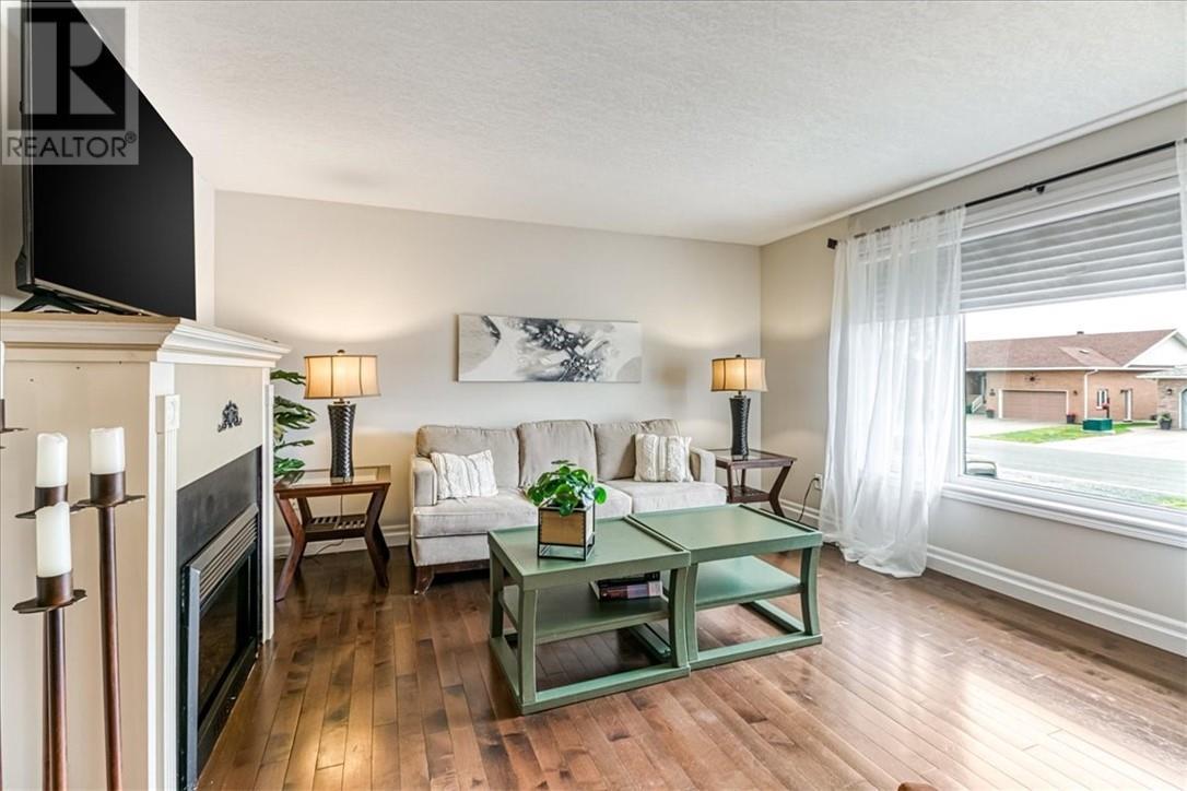 33 Oak, Capreol, ON - Indoor Photo Showing Living Room With Fireplace