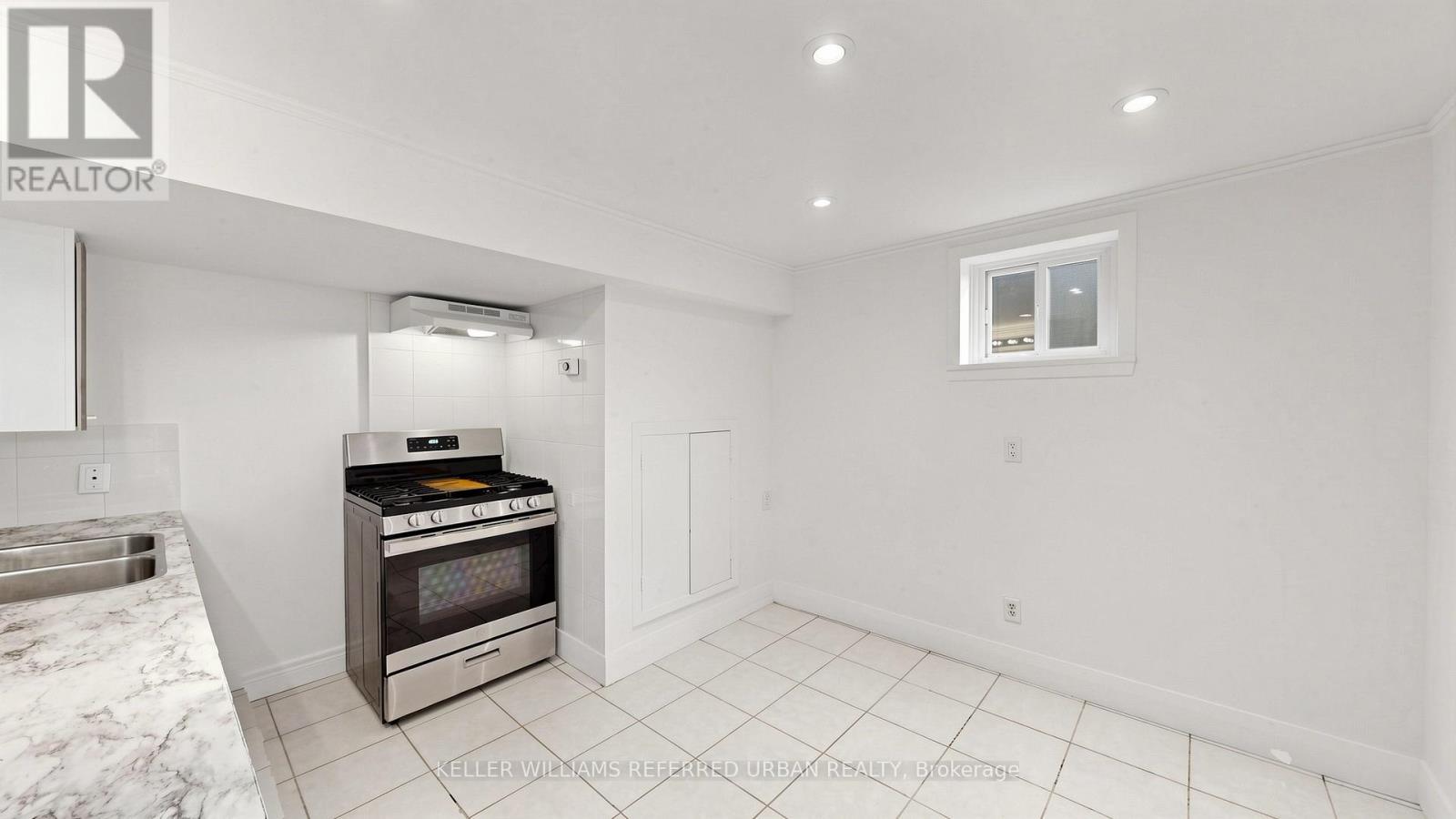 104 Otonabee Avenue, Toronto, ON - Indoor Photo Showing Kitchen With Double Sink