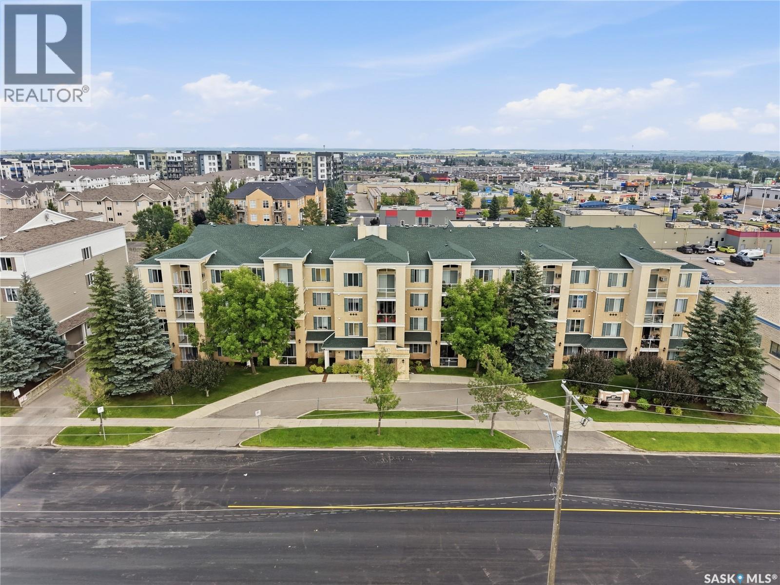 209 215 Lowe Road, Saskatoon, SK - Outdoor With Facade