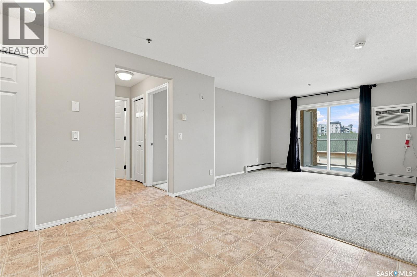 209 215 Lowe Road, Saskatoon, SK - Indoor Photo Showing Other Room