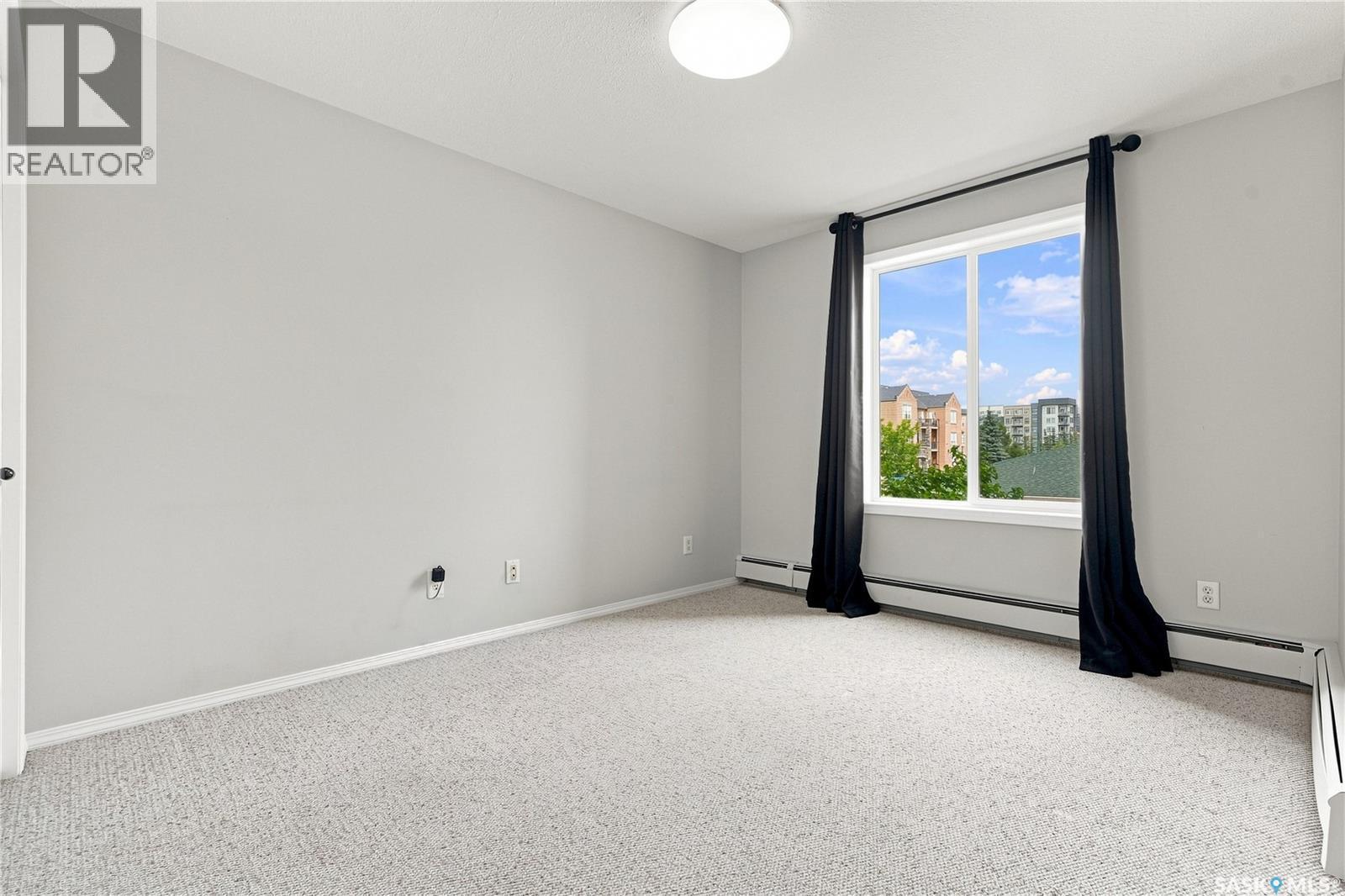 209 215 Lowe Road, Saskatoon, SK - Indoor Photo Showing Other Room