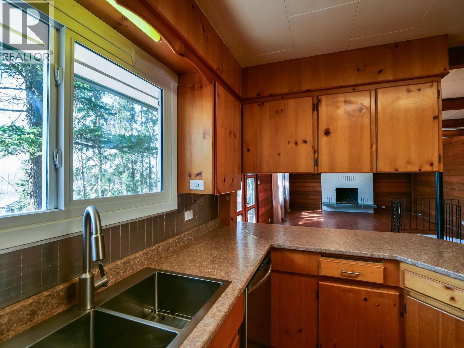 182 S Coach Road, Quesnel, BC - Indoor Photo Showing Kitchen With Double Sink