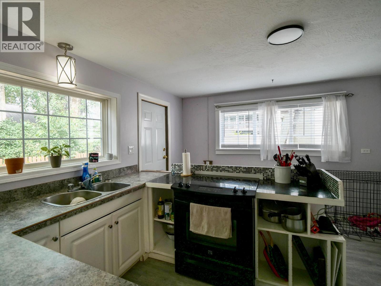 201 Lewis Drive, Quesnel, BC - Indoor Photo Showing Kitchen With Double Sink