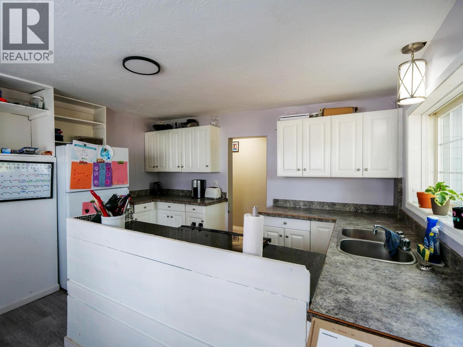 201 Lewis Drive, Quesnel, BC - Indoor Photo Showing Kitchen With Double Sink
