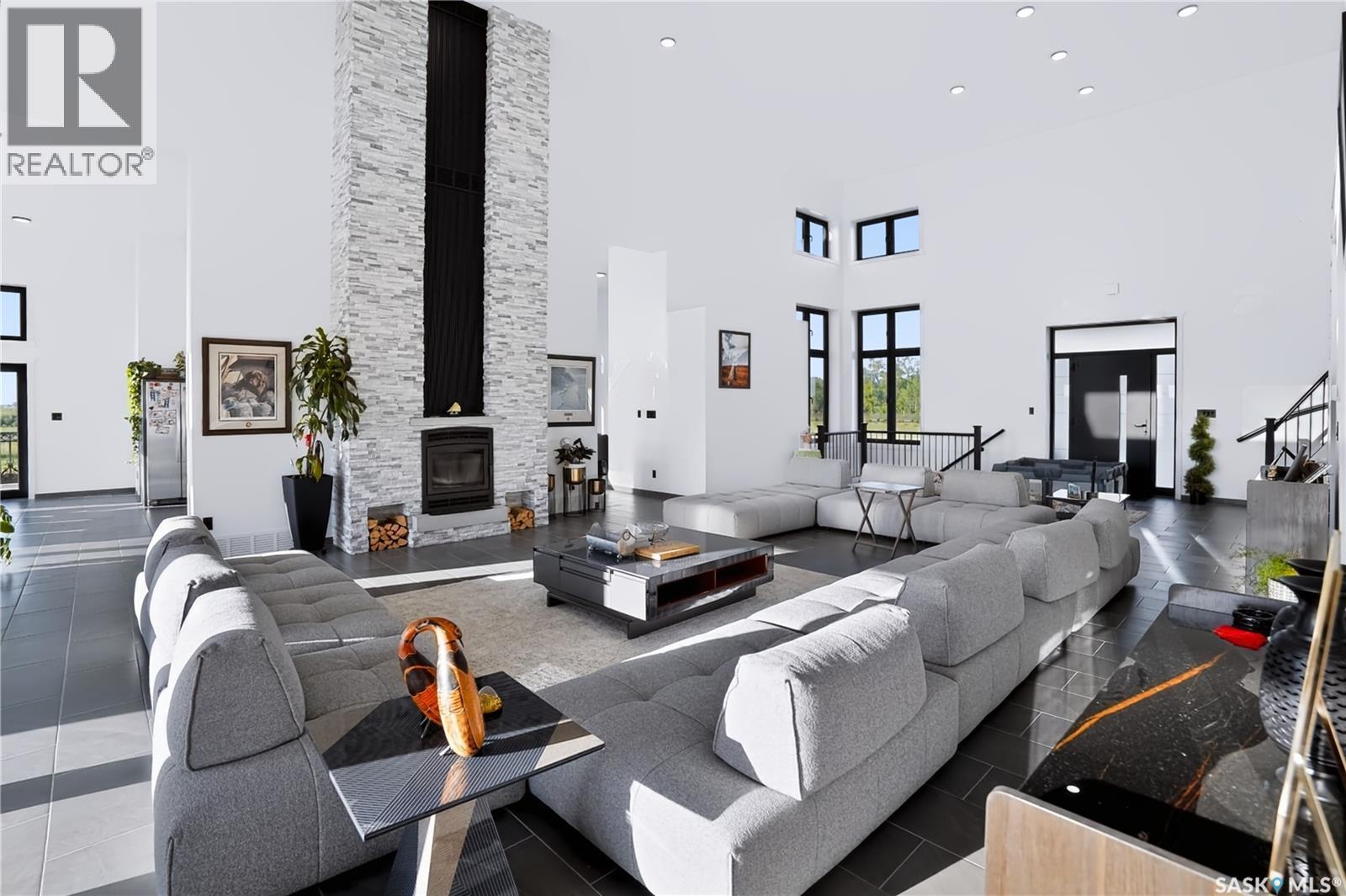 Ad Acreage, Corman Park Rm No. 344, SK - Indoor Photo Showing Living Room With Fireplace