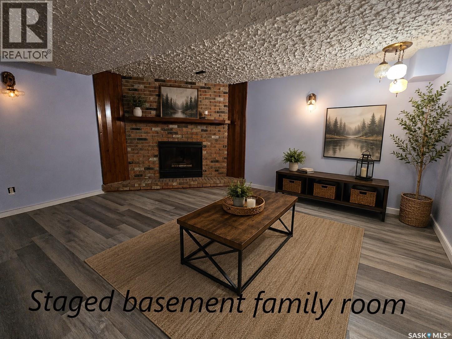1641 103Rd Street, North Battleford, SK - Indoor Photo Showing Living Room With Fireplace