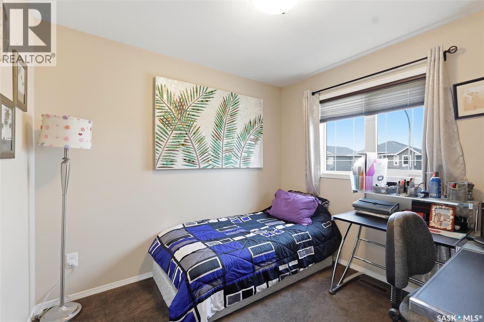 503 Maple Crescent, Warman, SK - Indoor Photo Showing Bedroom