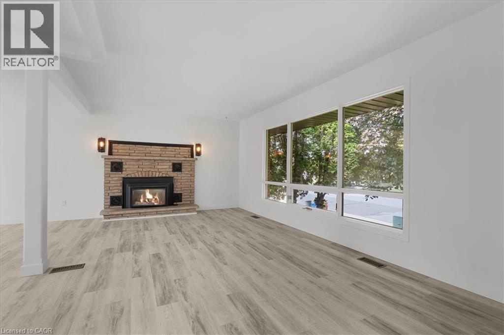 345 Berkindale Drive, Hamilton, ON - Indoor Photo Showing Living Room With Fireplace