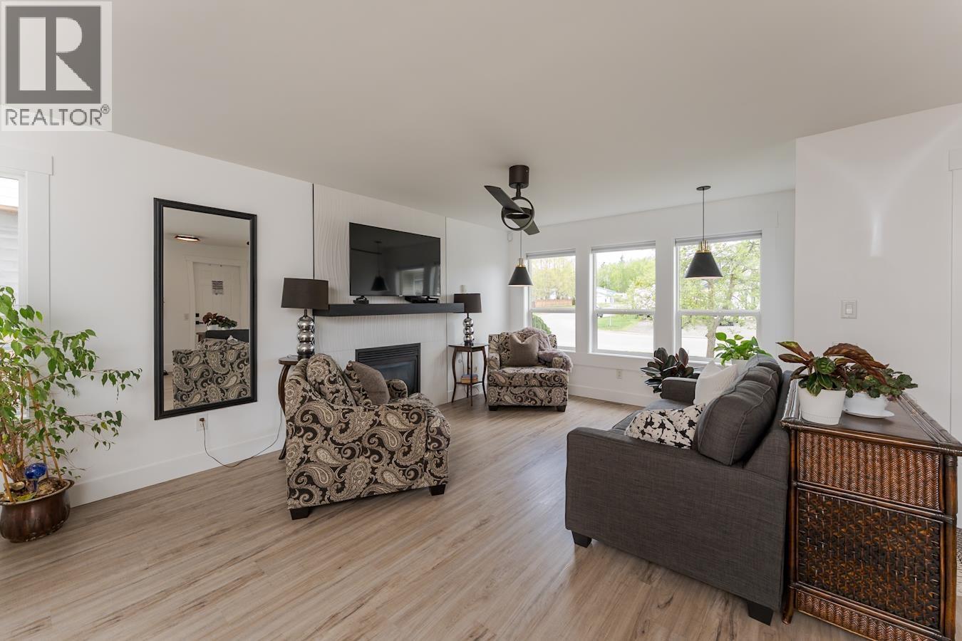 5940 Kovachich Drive, Prince George, BC - Indoor Photo Showing Living Room With Fireplace