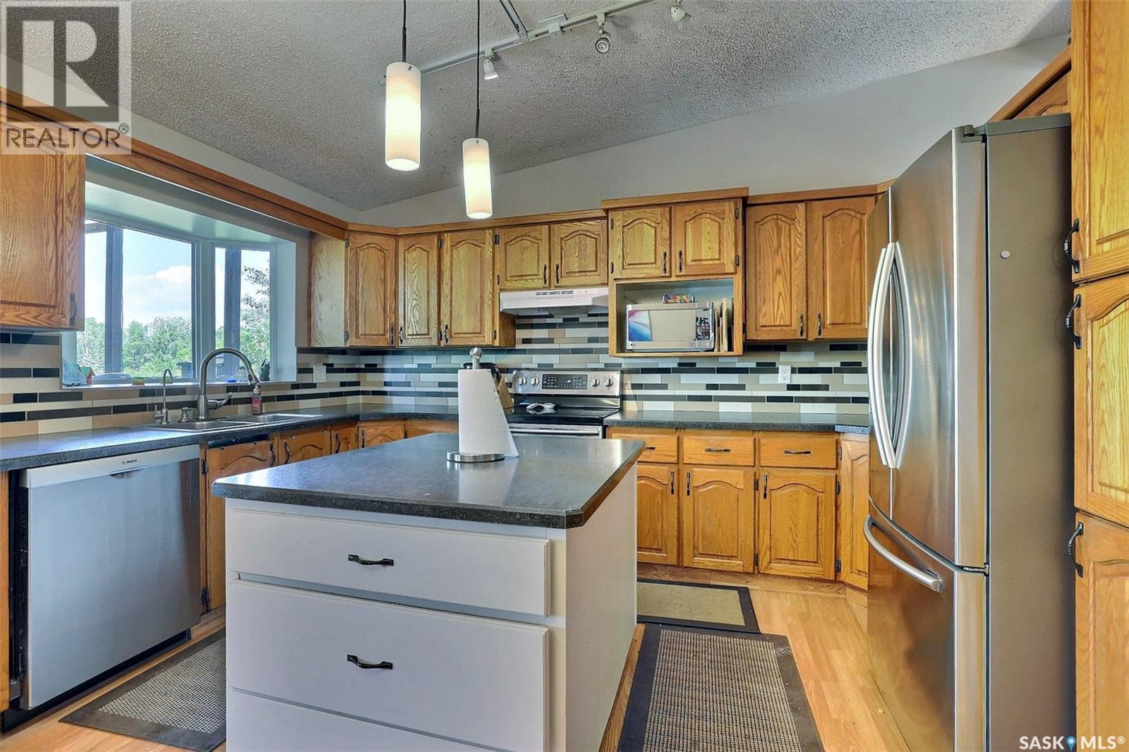 3419 Keehr Place E, Regina, SK - Indoor Photo Showing Kitchen With Double Sink