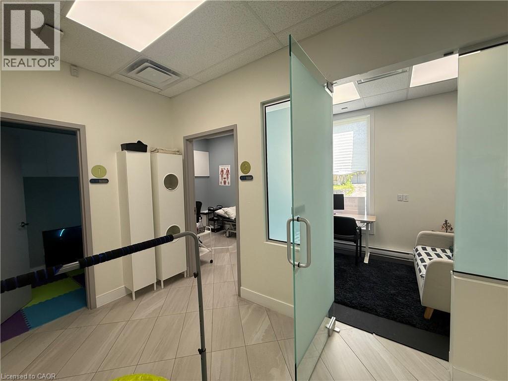 Frosted glass doors and a window provide privacy and natural light - 51 Benton Street, Kitchener, ON