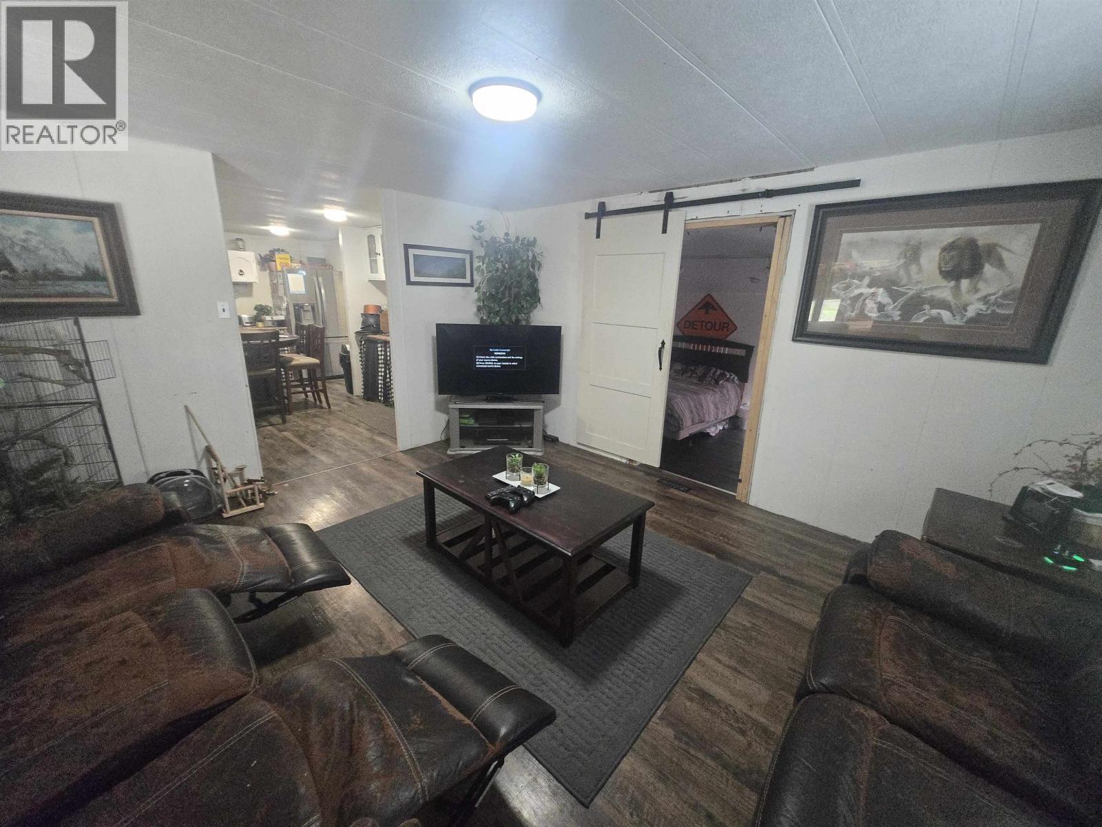 3231 Hayman Crescent, Quesnel, BC - Indoor Photo Showing Living Room With Fireplace