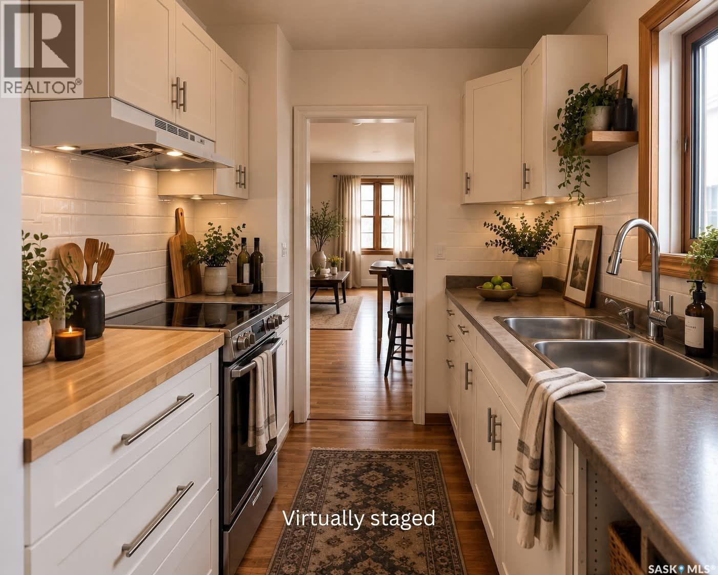 355 10Th Street E, Prince Albert, SK - Indoor Photo Showing Kitchen With Double Sink