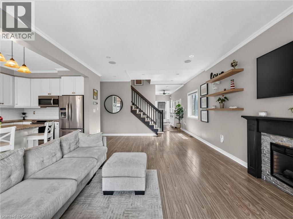 3 Hitching Post Ridge, Binbrook, ON - Indoor Photo Showing Living Room With Fireplace