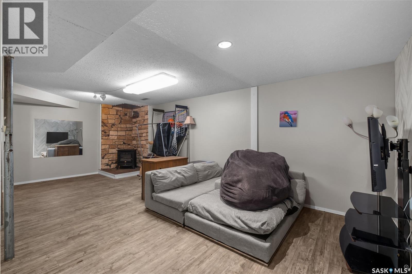 209 Macdowall Crescent, Prince Albert, SK - Indoor With Fireplace