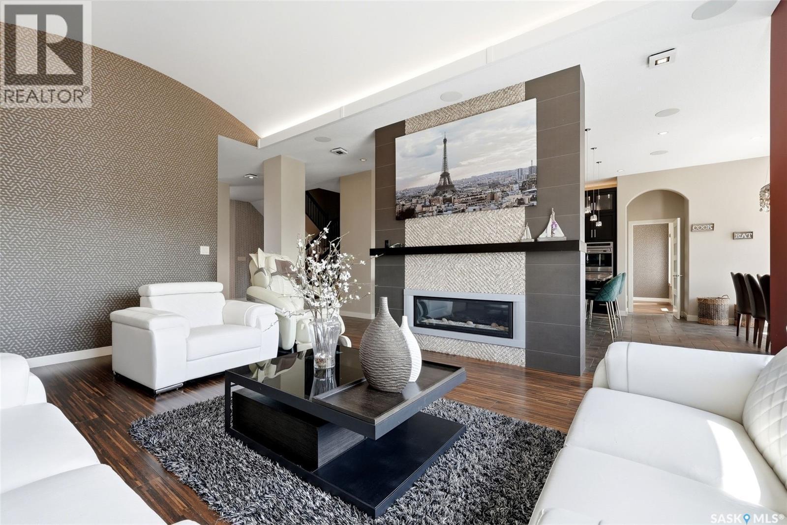 2423 Linner Bay, Regina, SK - Indoor Photo Showing Living Room With Fireplace